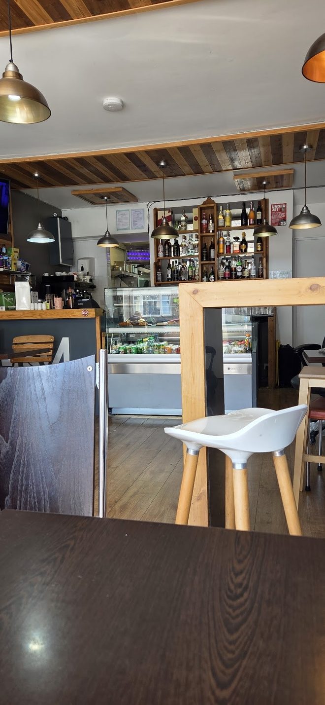 Looking across the café towards the deli fridge
