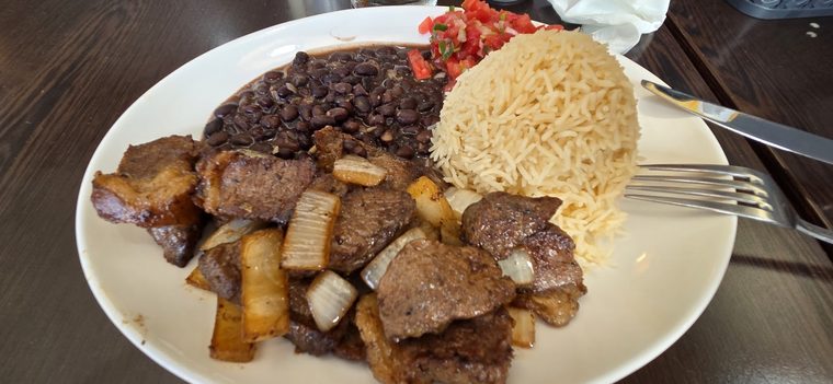 Steak with black beans, rice and fried plantain